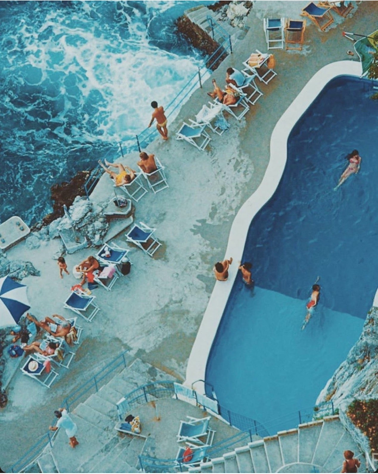 SLIM AARONS POOLSIDE